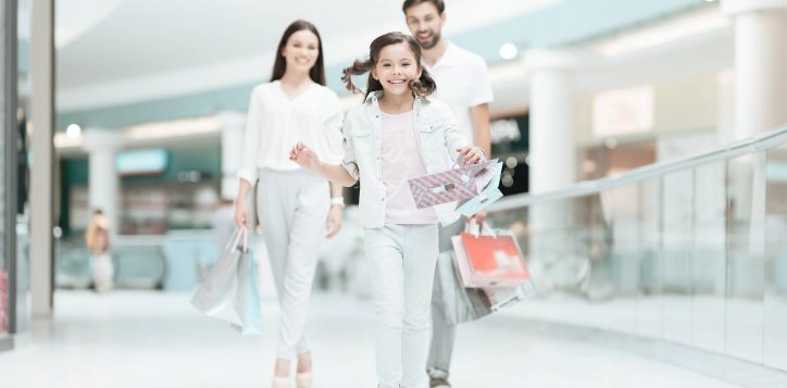 couple-with-daughter-are-walking-shopping-mall-2