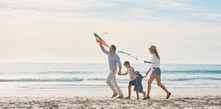 family-holding-hands-kite-beach-together-holiday-travel-vacation-summer-energy-love-running-with-mom-dad-children-sand-coast-by-ocean-sea-bonding-freedom-2